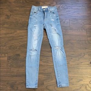 Medium washed Garage high rise ripped jeans